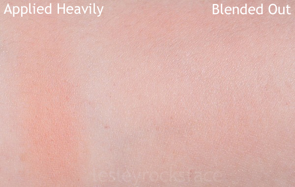 Photo taken outdoors in natural sunlight. Blush swatched on NC15 skin.